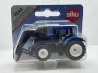 New Holland mit Palettengabel