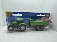 Deutz-Fahr Agrotron mit Universalstreuer 1673