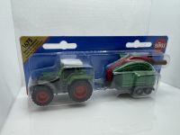 Fendt Favorit 926 Vario mit Holzhcksler 1675