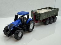 New Holland + Anh�nger + Heuballen