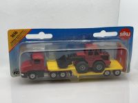 Scania Tieflader mit Frontlader 1616